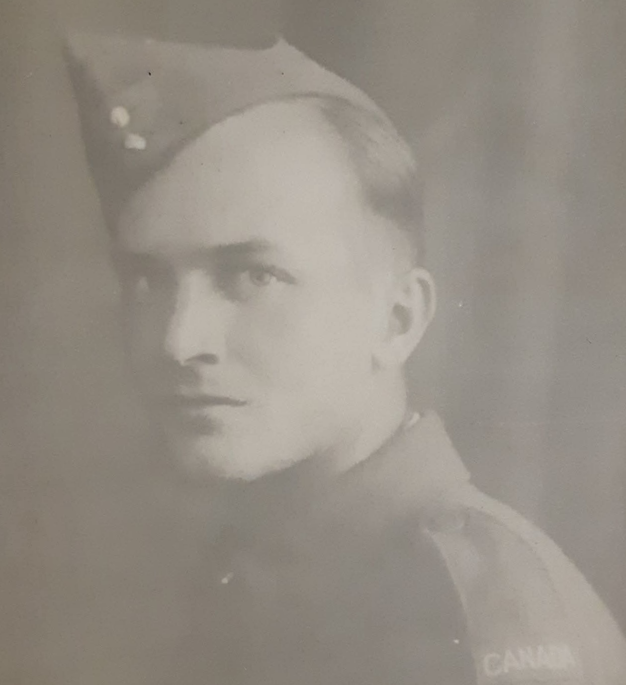 A person in uniform with a hat