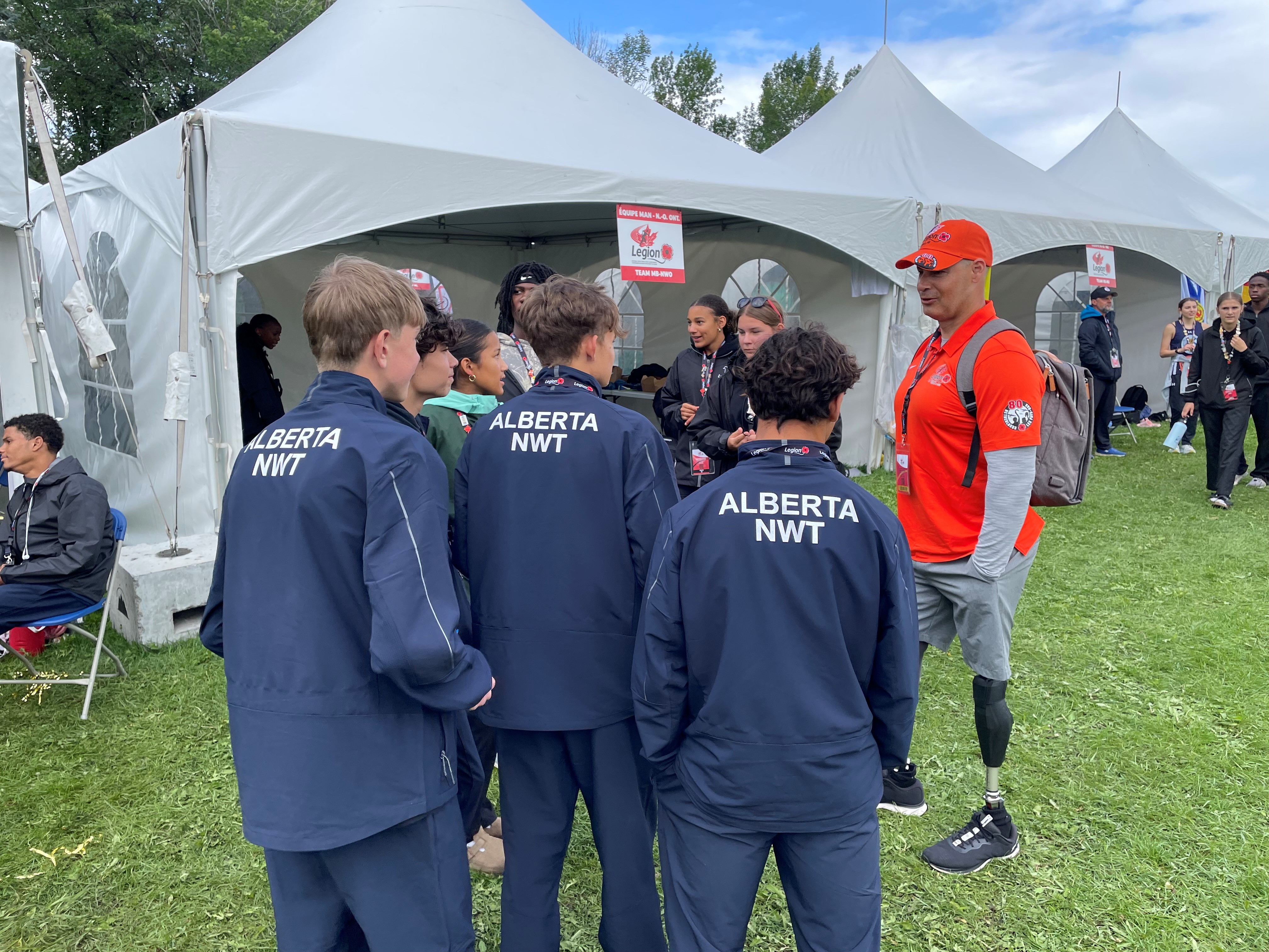 Mike Trauner with athletes from AB-NWT Command