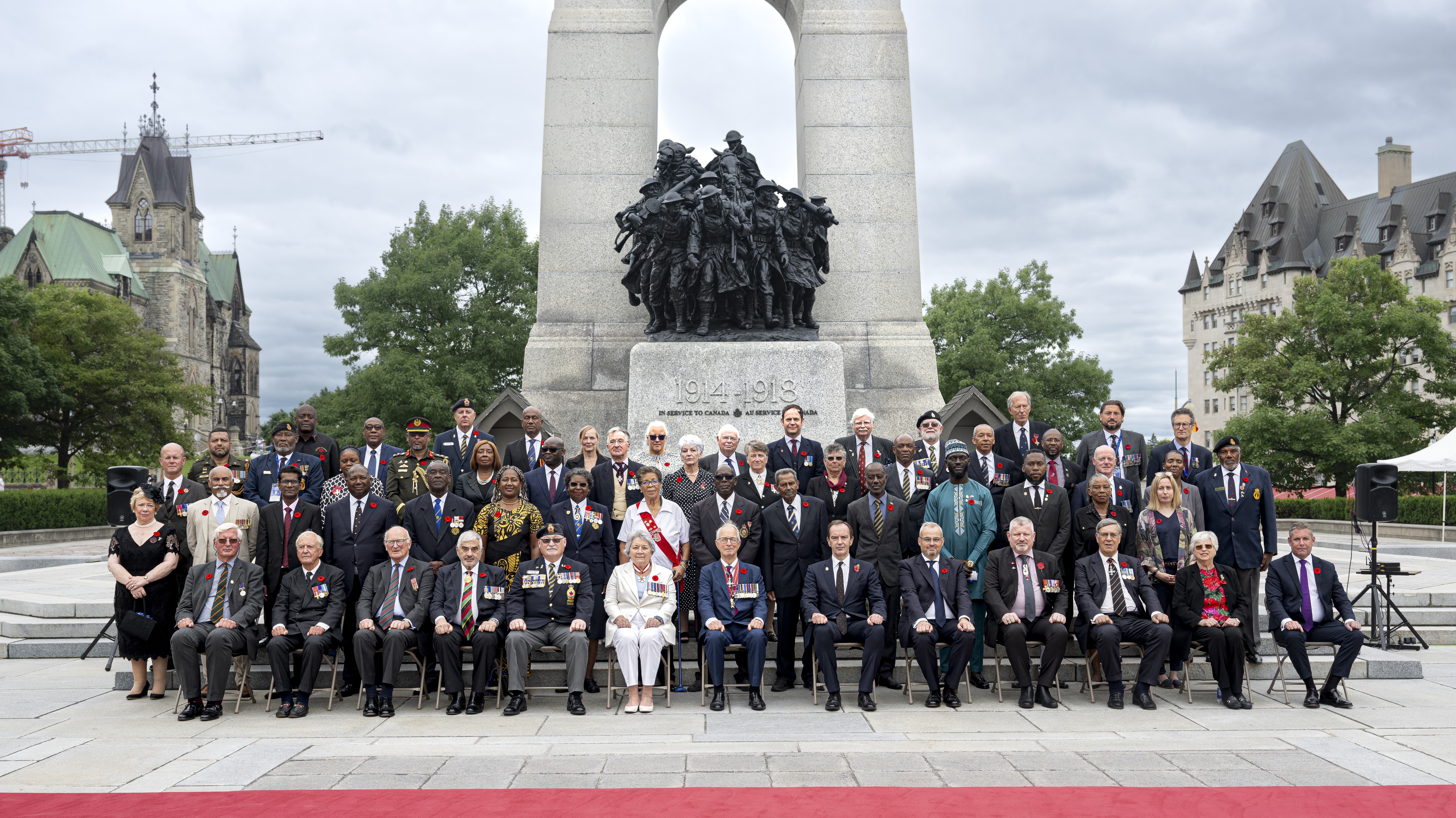 Members of the Royal Commonwealth Ex-Services League assemble in front of the National War Memorial in Ottawa